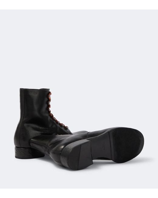 Stivali Stringati di Prada in Black da Uomo