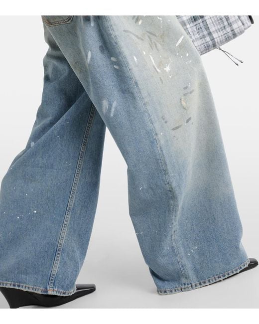 Jeans anchos desgastados de tiro medio Acne de color Blue