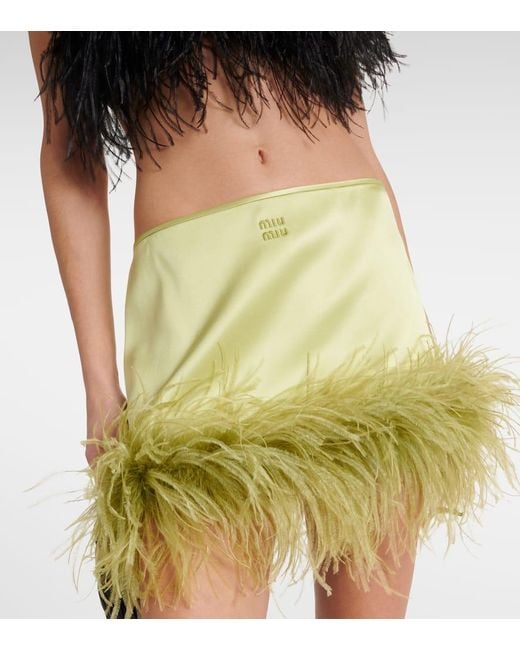 Minifalda De Saten Con Plumas Miu Miu de color Yellow