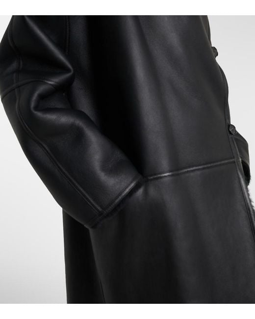 Totême Black Shearling-Lined Leather Coat