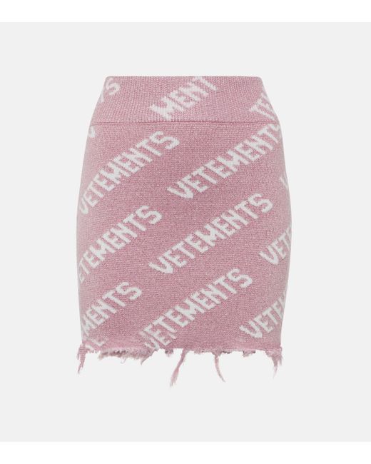 Mini-jupe en laine melangee Vetements en coloris Pink