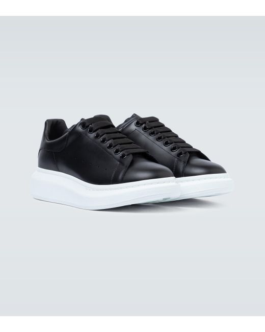 black leather platform trainers