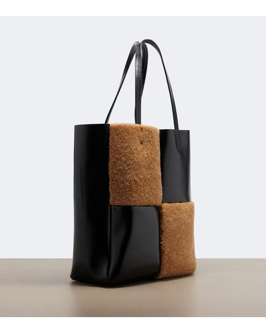 Khaite Black Zoe Medium Shearling Paneled Tote Bag