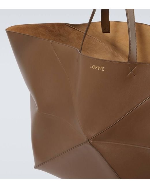 https://cdna.lystit.com/520/650/n/photos/mytheresa/88646833/loewe-brown-Tote-Puzzle-Fold-Extra-Large.jpeg