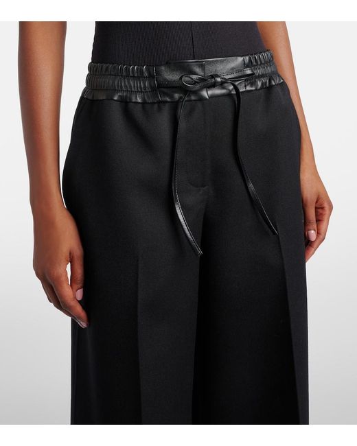 Alaïa Black Leather-Trimmed Virgin Wool Wide-Leg Pants