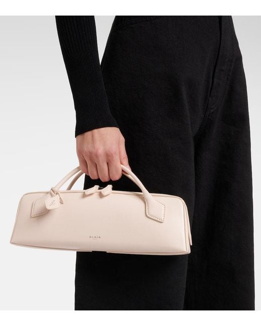 Clutch Le Teckel di Alaïa in Natural