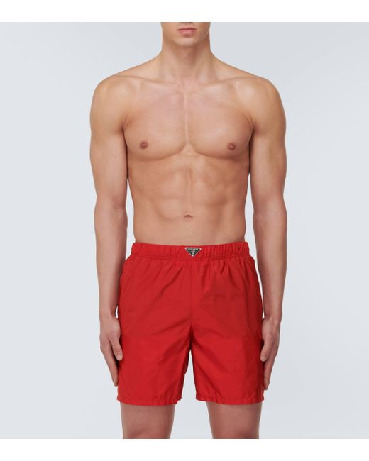 Short de bain a logo Prada pour homme en coloris Red