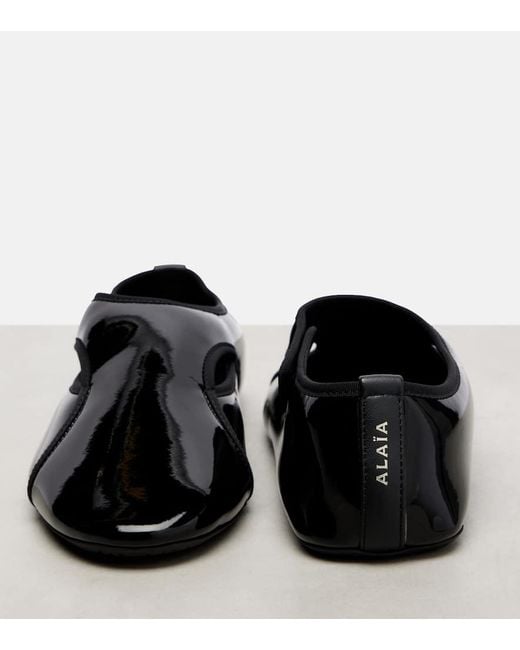 Ballerines Criss Cross En Cuir Alaïa en coloris Black