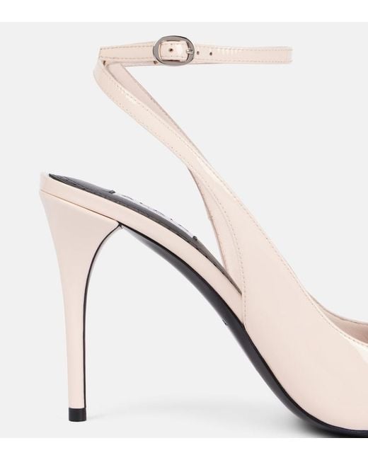 Alaïa White Patent Leather Slingback Pumps