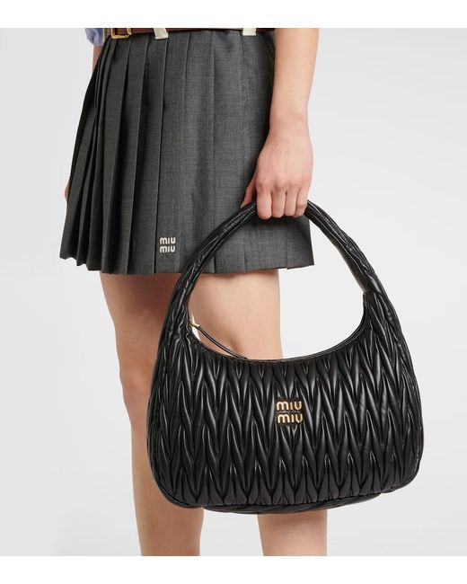 バッグ miu miu Quilted shoulder bag black 18464339_39600252_1000.jpg