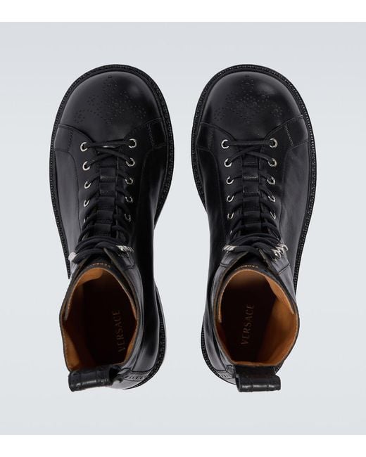 Versace Black Billy Perforated Leather Combat Boots for men