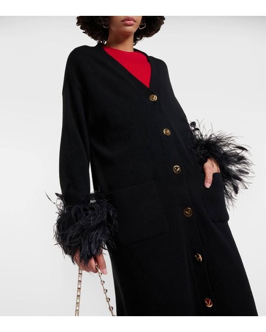 Cardigan de lana virgen con plumas Valentino de color Black