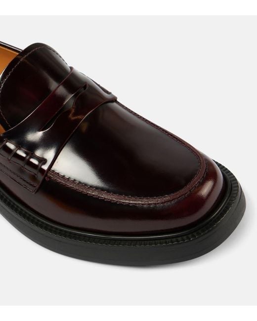 Tod's Black Leather Penny Loafers