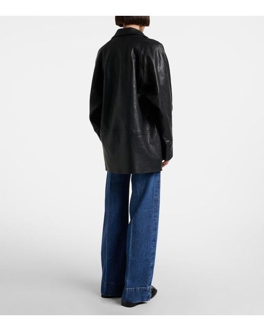 FRAME Blue Slice High-Rise Flared Jeans