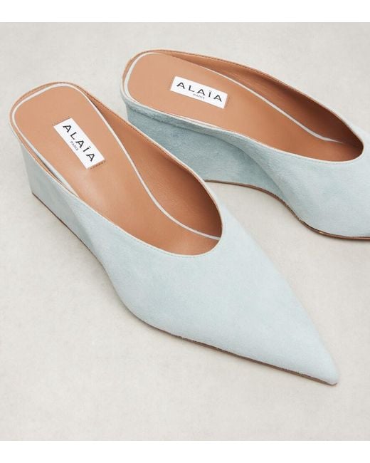 Alaïa White Cube 75 Suede Wedge Mules