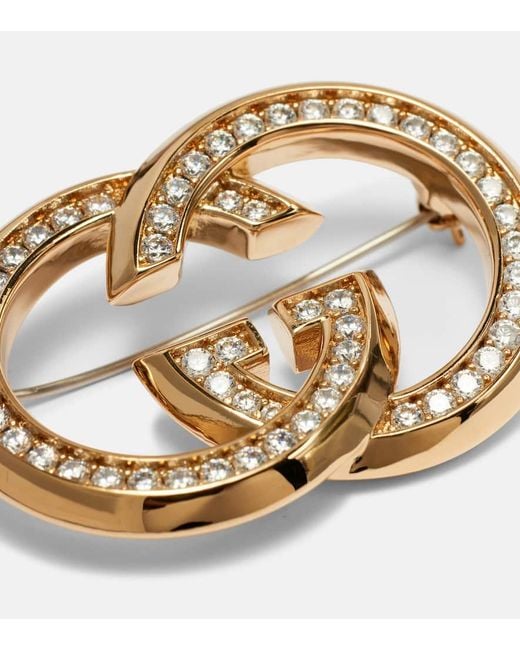 Broche Interlocking G A Ornements Gucci en coloris Metallic