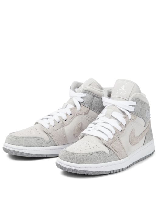 Baskets Air Jordan 1 en daim Nike en coloris Gris | Lyst