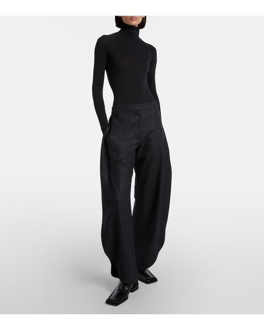 Alaïa Black Leather Slingback Flats