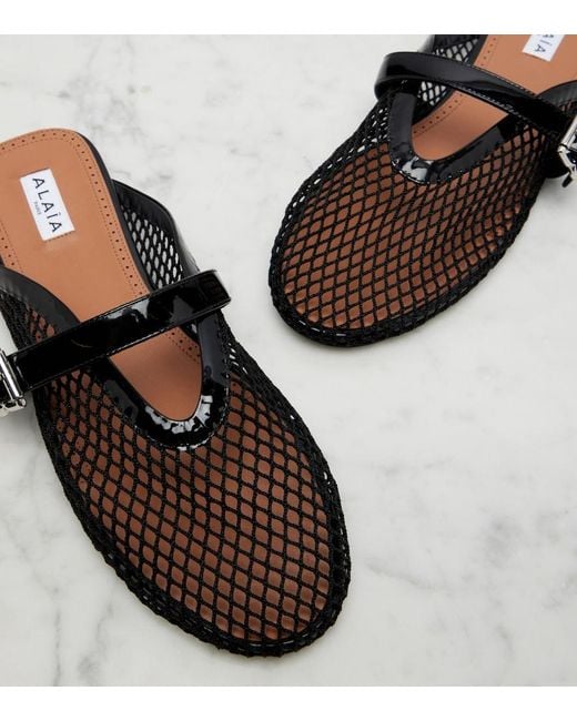 Alaïa Black Fishnet Leather-Trimmed Mules