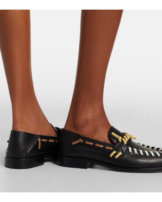 Tod's Black Leather Loafers