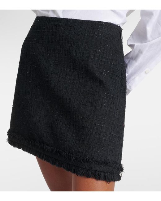 Minigonna in tweed di misto lana di Versace in Black