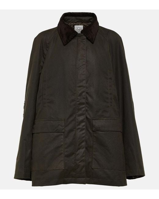 Totême Country Coated Cotton Jacket in Black | Lyst