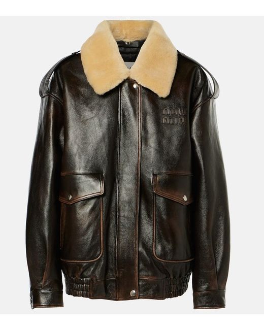 Veste En Cuir Et Shearling A Logo Miu Miu en coloris Black