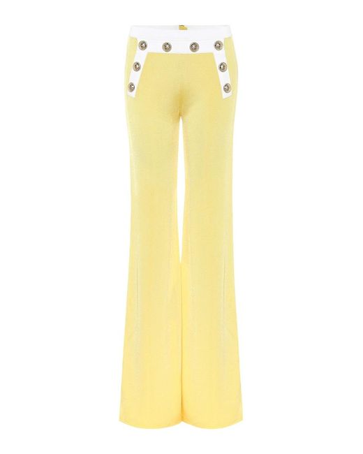 Pantalones Flared De Punto Tiro Alto Balmain de color Yellow