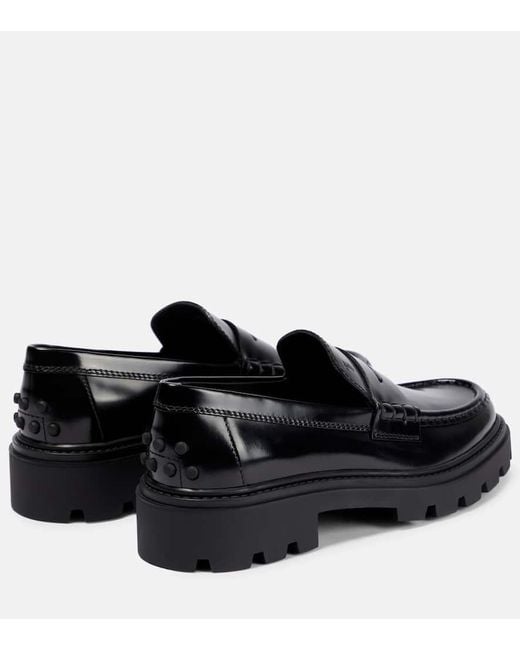 Tod's Black Schwarze Lederflache Slipper Für Damen