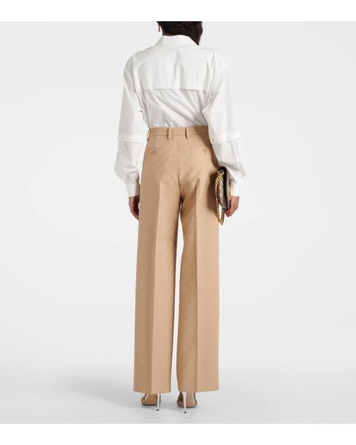Pantaloni regular in jacquard di lana GG di Gucci in Natural
