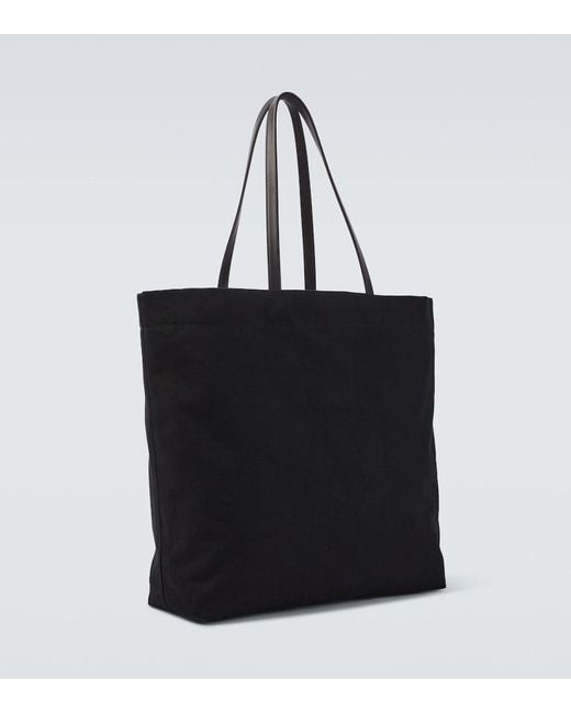 The Row Black Tori Leather-Trimmed Canvas Tote Bag for men