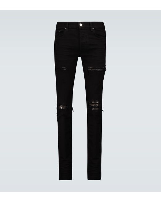 all white amiri jeans