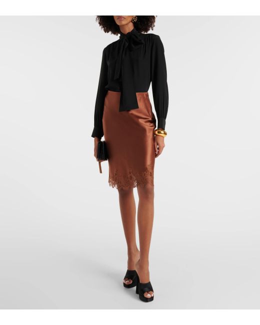 Mini-jupe en satin de soie et dentelle Saint Laurent en coloris Brown
