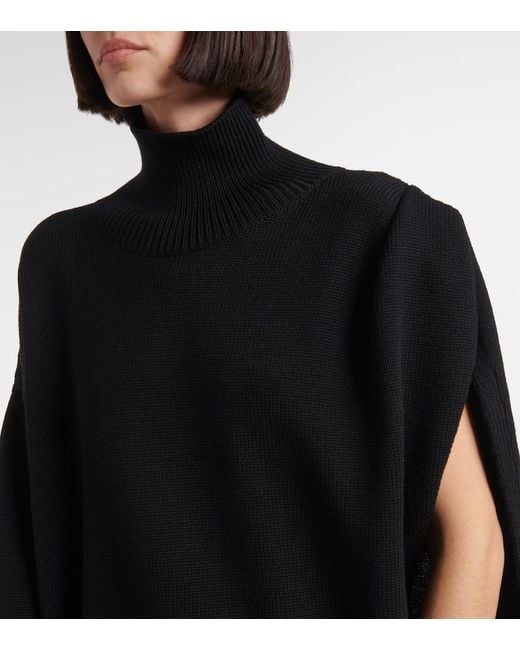 Alaïa Black Turtleneck Asymmetric Cape Hybrid Wool Sweater