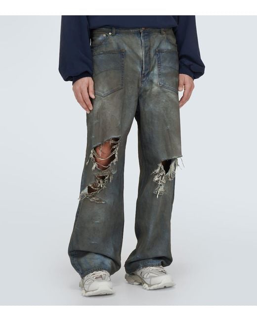 Jeans anchos con rotos Balenciaga de hombre de color Gray