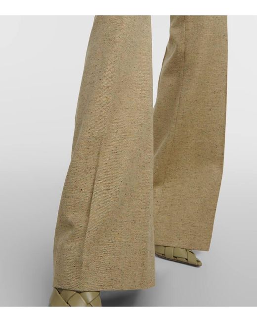 Pantaloni flared in misto lana di Victoria Beckham in Natural