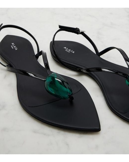 Alaïa Black Embellished Patent Leather Thong Sandals