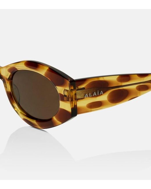Alaïa Brown Logo Oval Sunglasses