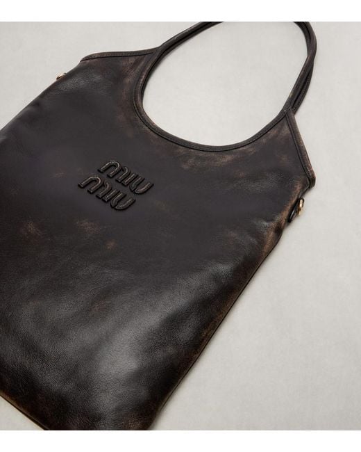 Bolso Al Hombro Ivy De Piel Con Efecto Desgastado Miu Miu de color Black