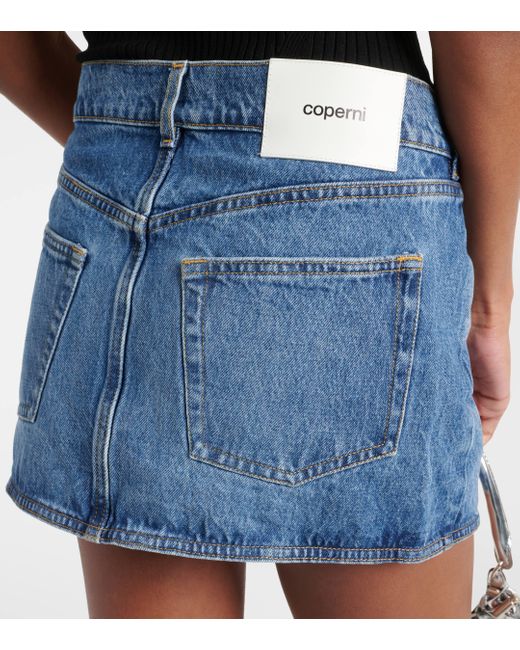 Mini-jupe portefeuille en jean Coperni en coloris Blue