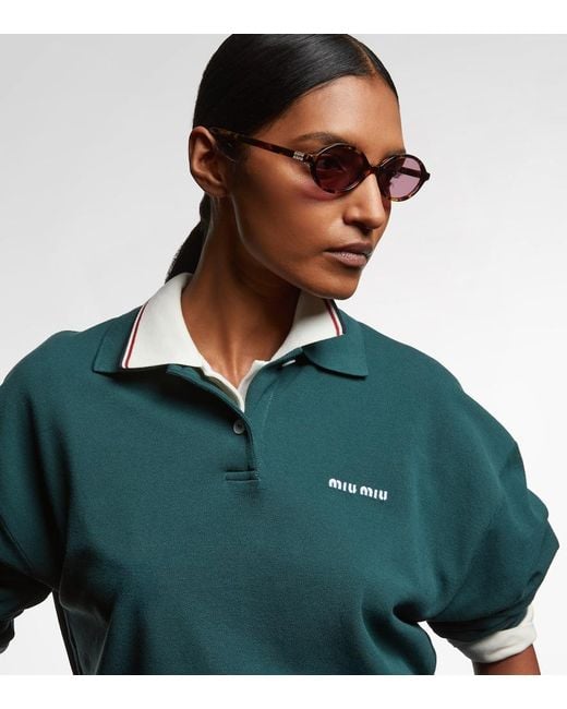 Miu Miu Pink Miu Regard Round Sunglasses