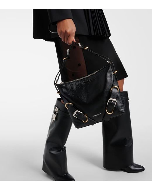 Bolso cruzado Voyou de piel Givenchy de color Black