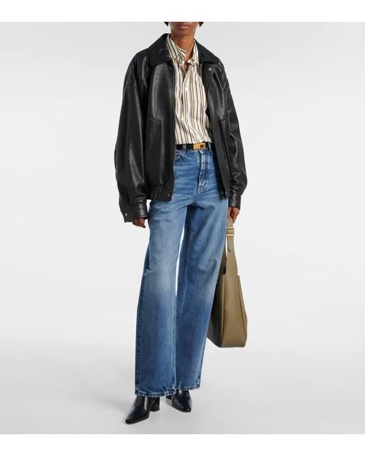 Jeans A Gamba Larga V-Waist di Saint Laurent in Blue