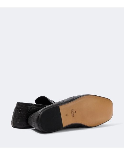 Gucci Black Gg Embossed Leather Loafers for men