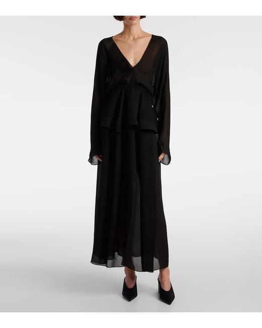 Alaïa Black Peplum Midi Dress