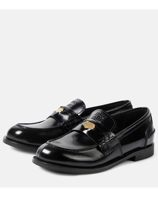 Miu Miu Black Loafers aus Leder