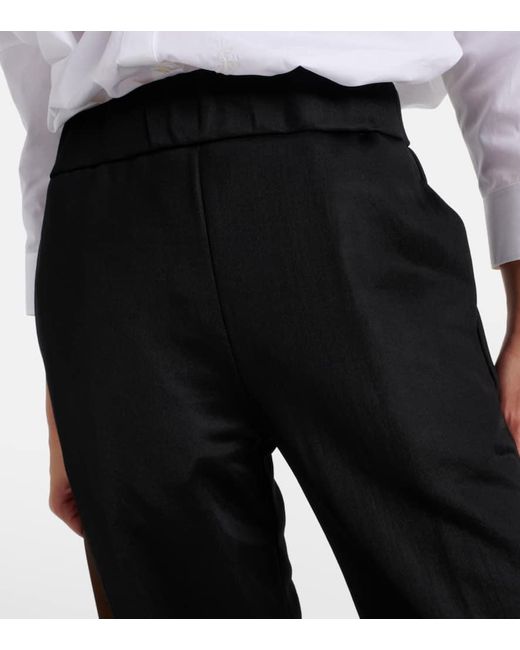 Pantaloni slim a vita alta di Jil Sander in Black