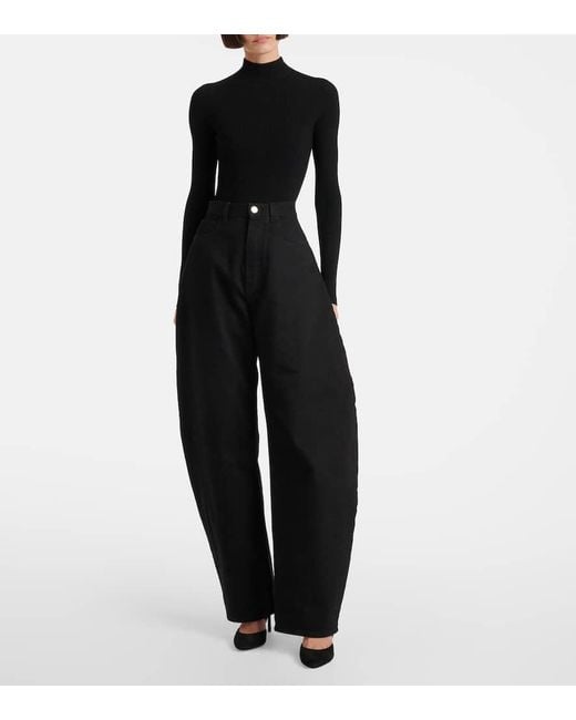 Alaïa Black Cutout Suede Ankle Boots