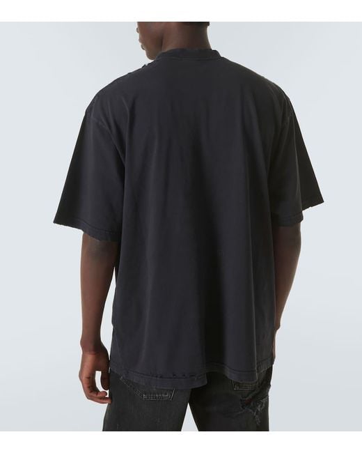 Balenciaga Oversized-T-Shirt aus Baumwoll-Jersey mit Print in Distressed-Optik in Black für Herren