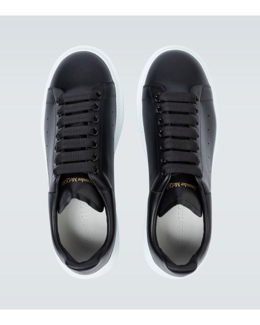 black leather platform trainers